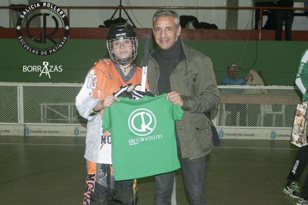 Roberto García con un jugador de HL Morcegos